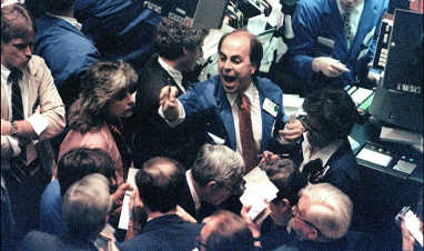 The trading pit at NYSE in 1987 - Source: AP